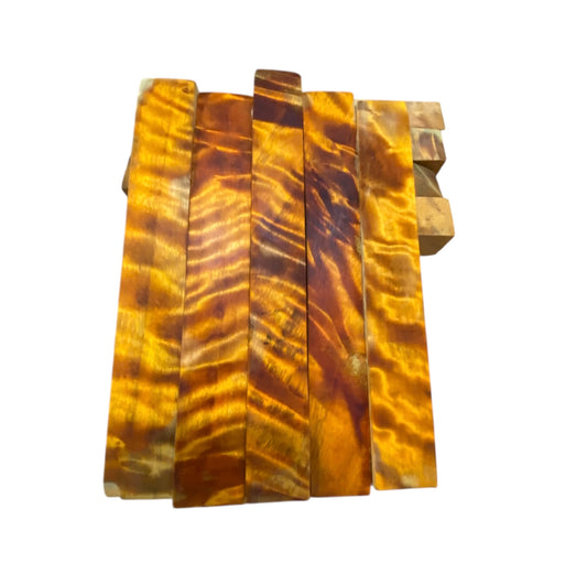 Orange curly cotton wood