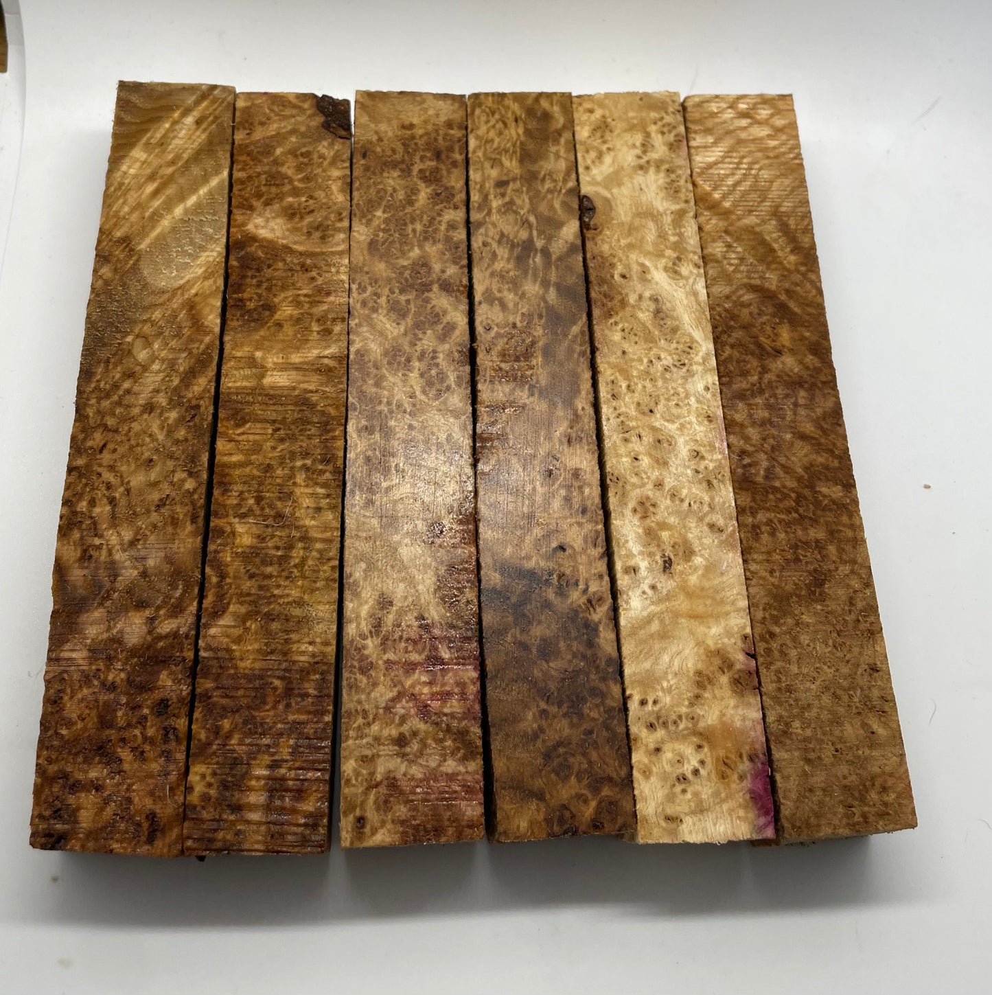 Stabilized black ash burl