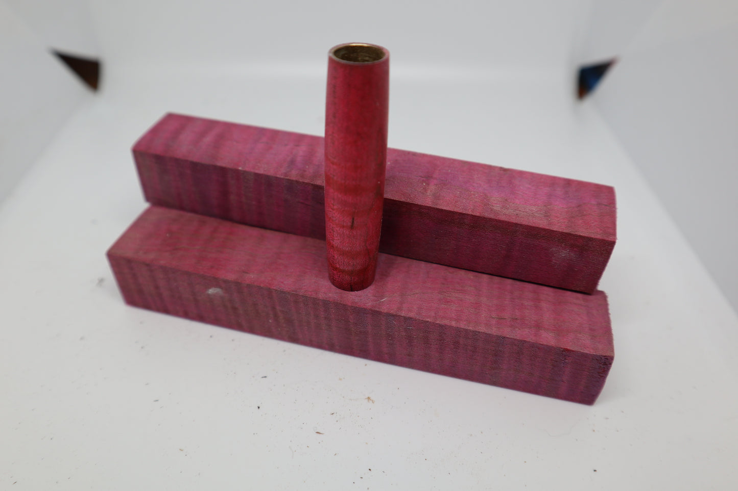 Pink dye stabilized curly maple